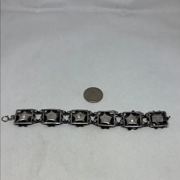 Gorgeous Hobe sterling silver floral bracelet.
